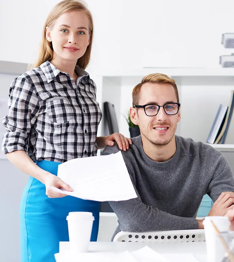 IT consultants reviewing documents